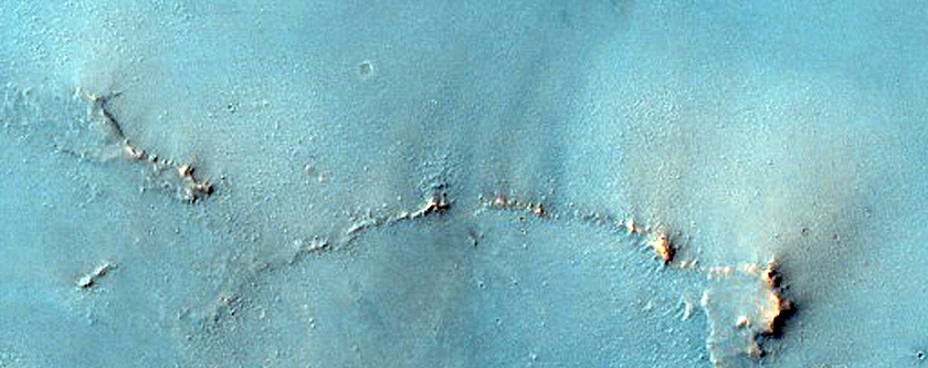 Crater Ejecta with Hydrated Materials in Syrtis Major Planum
