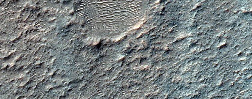 Mesa Feature within Degraded Crater