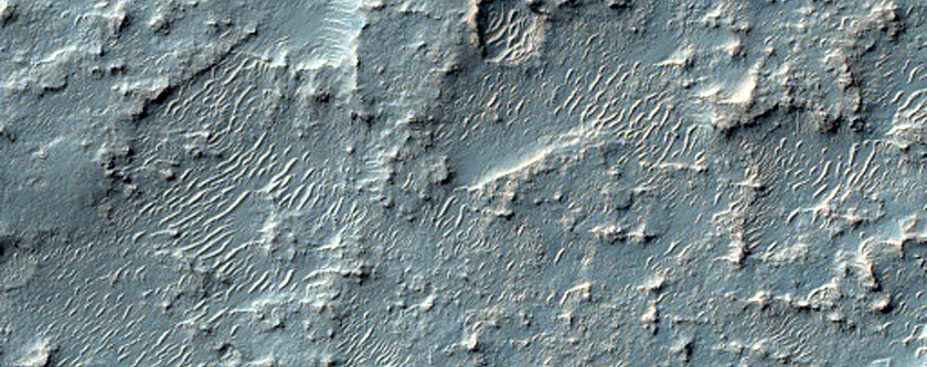 Possible Olivine-Bearing Materials in Southeast Huygens Crater