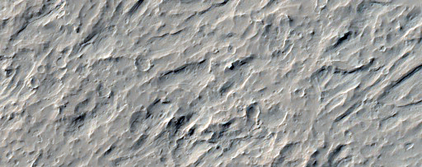 Layering in Heavily Cratered Lucus Planum Terrain