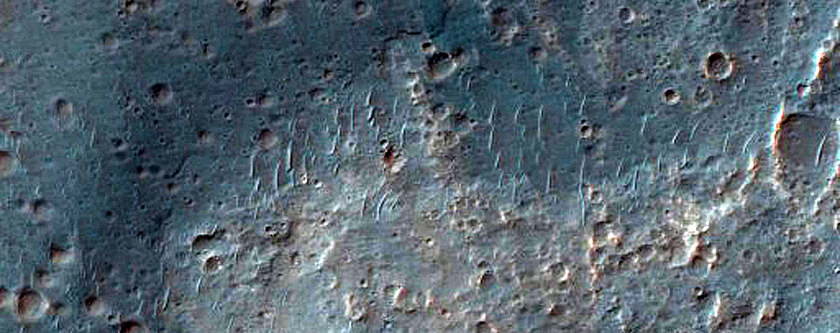 Alluvial Fan and Light-Toned Deposits in Coprates Catena Trough