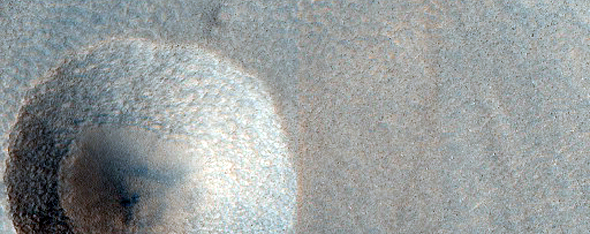 Small Crater on Inner Wall of Larger Crater