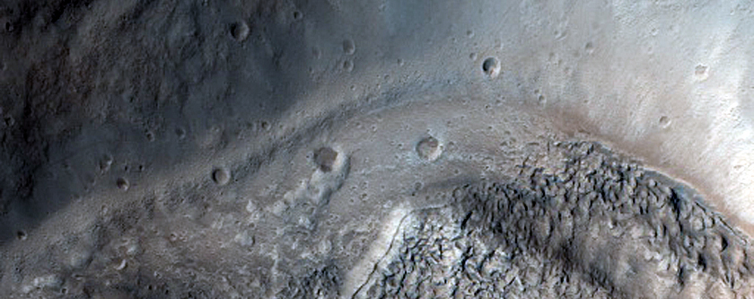 North-Pole-Facing Deposit in Crater Associated with Headwall Erosion