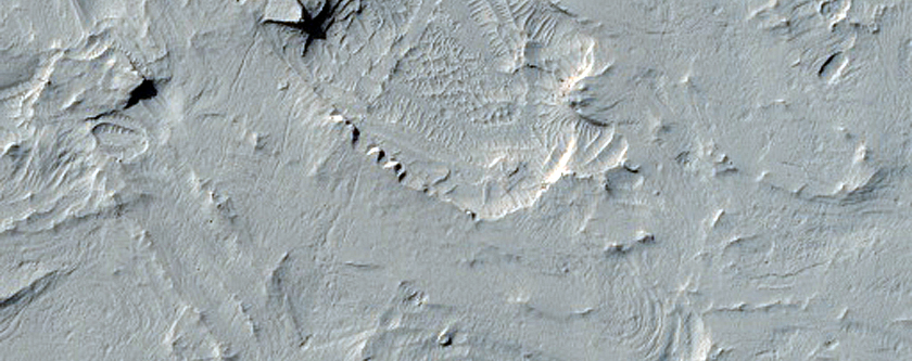 Layering in Sinuous Terrain