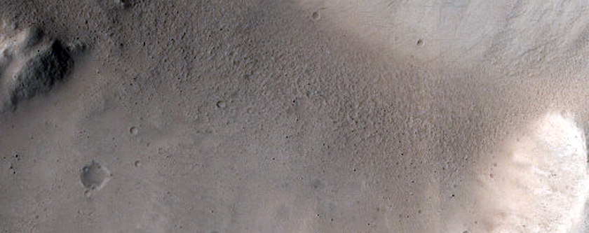 North-Pole-Facing Deposit in Crater Associated with Headwall Erosion