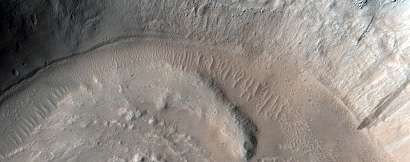 North-Pole-Facing Deposit in Crater Associated with Headwall Erosion