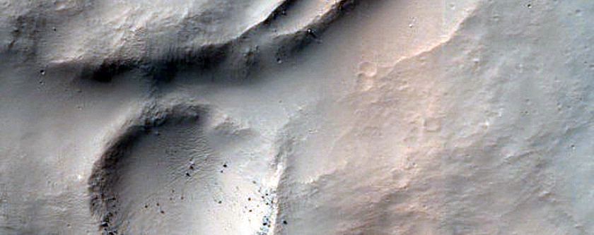 Bedrock Exposed in Possible 34-Kilometer Explosion Crater