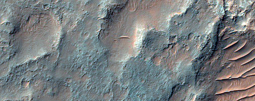 Dark Material and Graben near Ladon Valles