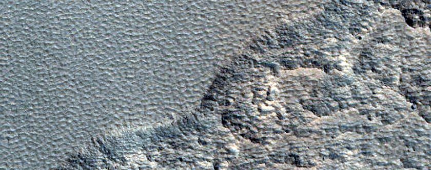 Small Icy Scarps in Milankovic Crater