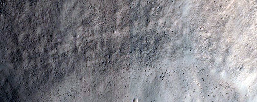 North-Pole-Facing Deposit in Crater Associated with Headwall Erosion