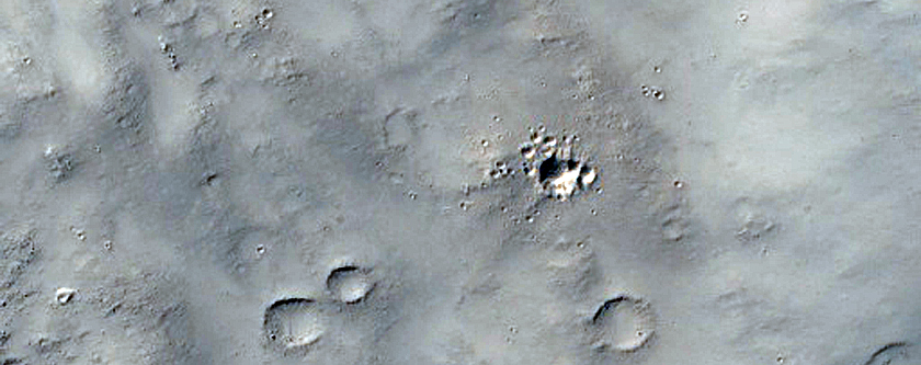 Impact Crater Ejecta in Memnonia Fossae