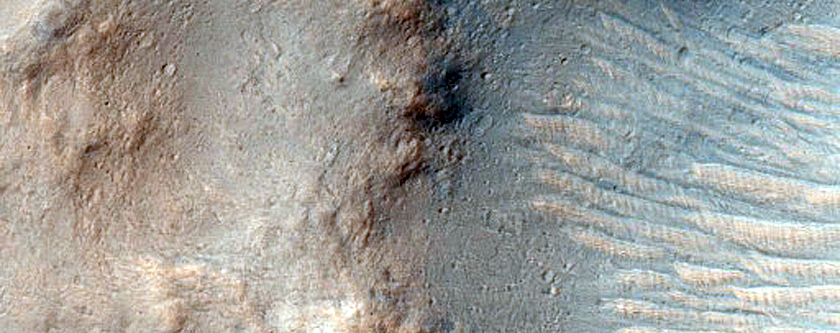Phyllosilicates Exposed by Crater in Tyrrhena Terra