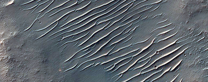 Small Crater and Channels near Melas Fossae