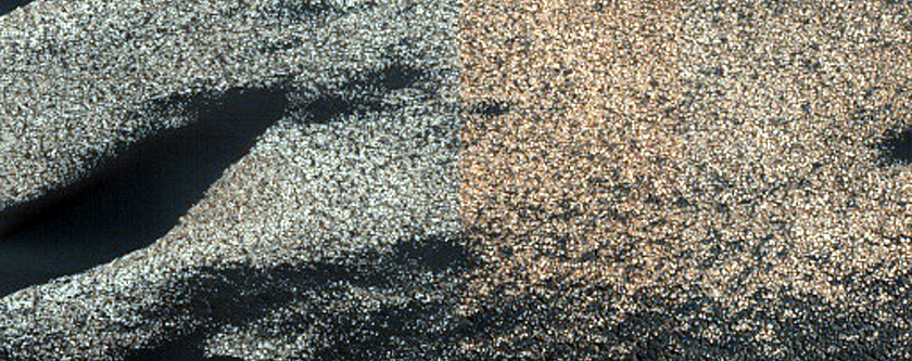 Upwind West Olympia Dune Interaction with Residual Polar Ice