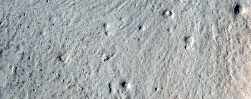 North-Pole-Facing Deposit in Crater Associated with Headwall Erosion