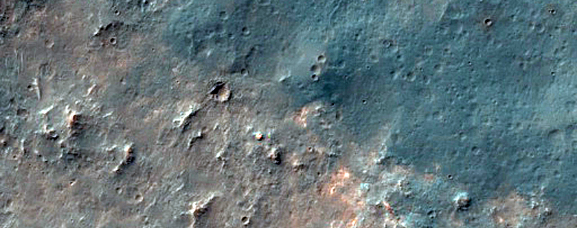 Light-Toned Deposits in Crater South of Coprates Chasma