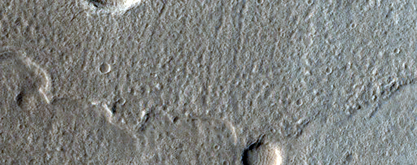 North-Pole-Facing Deposit in Crater Associated with Headwall Erosion