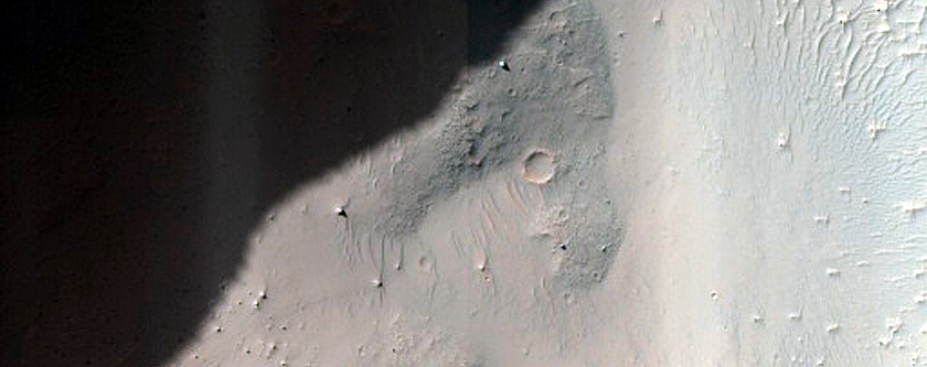Frost Survey in Steep and Fresh-Looking Crater