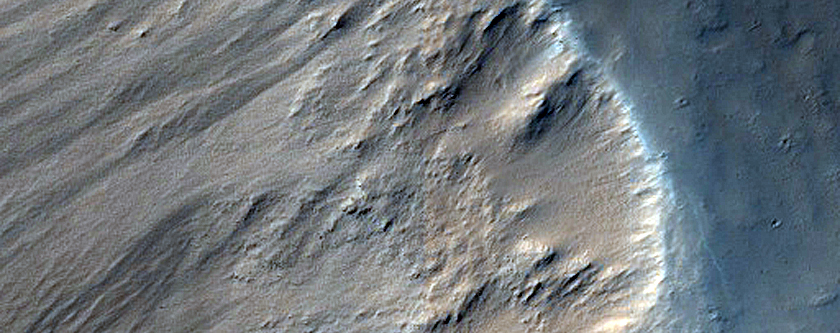 Impact Related Deposits and Flows near Pettit Crater