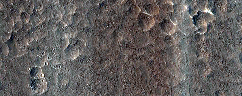 Pitted Cones with Moat near Potential Volcano