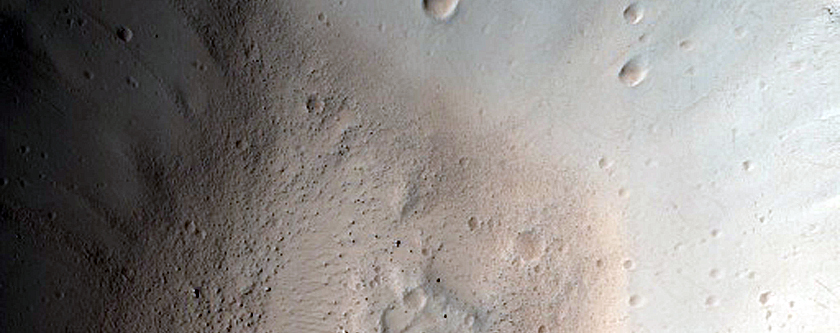 North-Pole-Facing Deposit in Crater Associated with Headwall Erosion