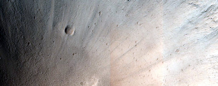 North-Pole-Facing Deposit in Crater Associated with Headwall Erosion