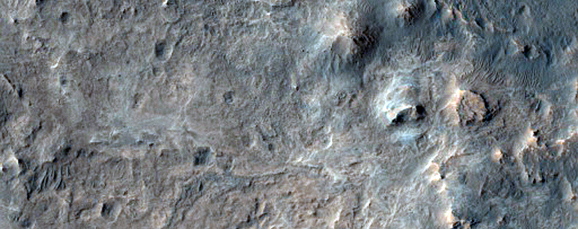 Exposed Light-Toned Material on Crater Rim near Mawrth Vallis