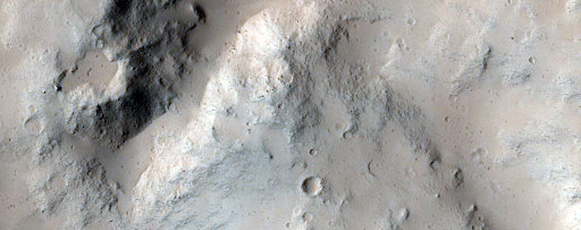 North-Pole-Facing Deposit in Crater Associated with Headwall Erosion