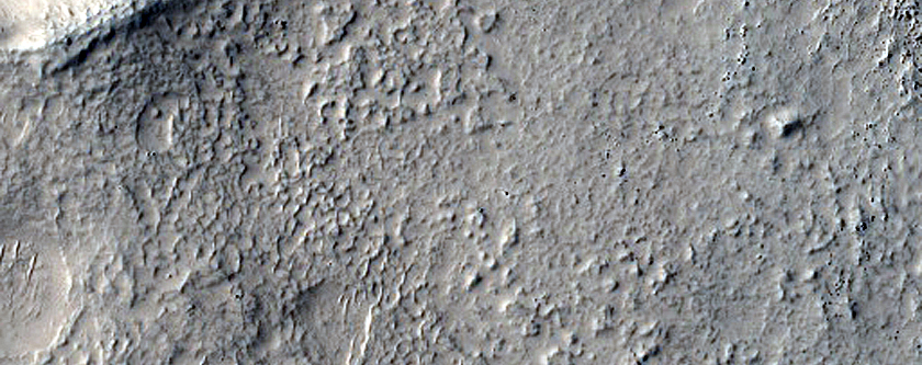 Layered Feature in Crater in Nilosyrtis Mensae