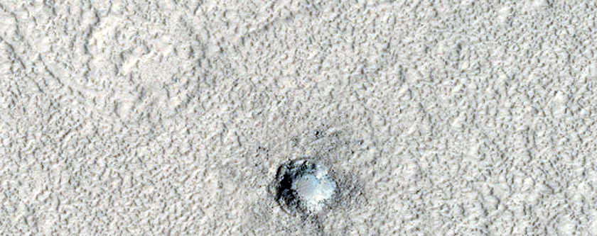 Possible Vent on Volcanic Terrain near Lineated Valley Floor Material