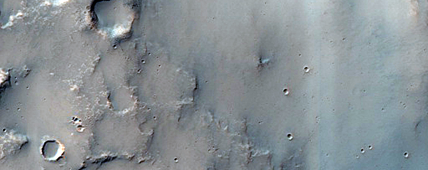 Curved Channels in Flaugergues Crater