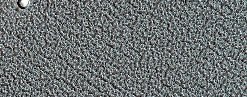 Small Ice Filled North Polar Layered Deposit Crater