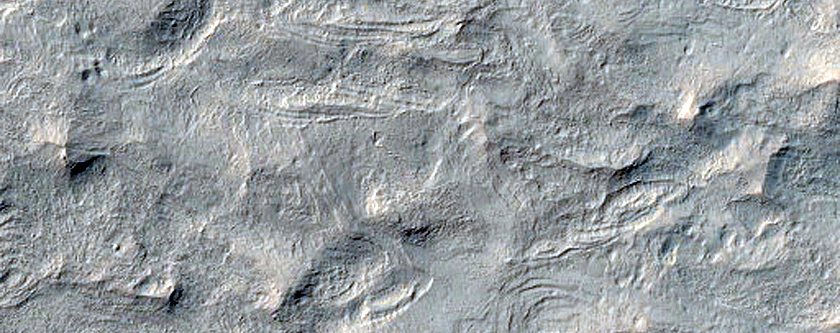 Yardang-Forming Material in or near Apollinaris Sulci and Lucus Planum