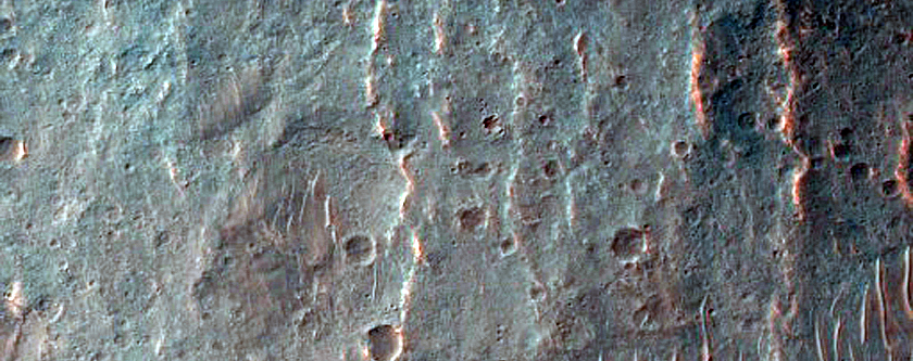 Alluvial Fan and Light-Toned Deposits in Coprates Catena Trough