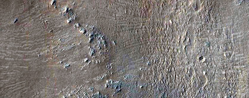 Contact between East Daedalia Planum Flows and Claritas Fossae Upland