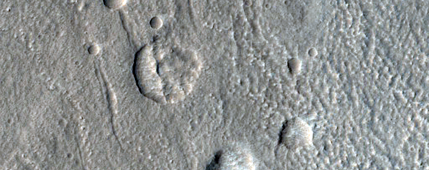 North-Pole-Facing Deposit in Crater Associated with Headwall Erosion