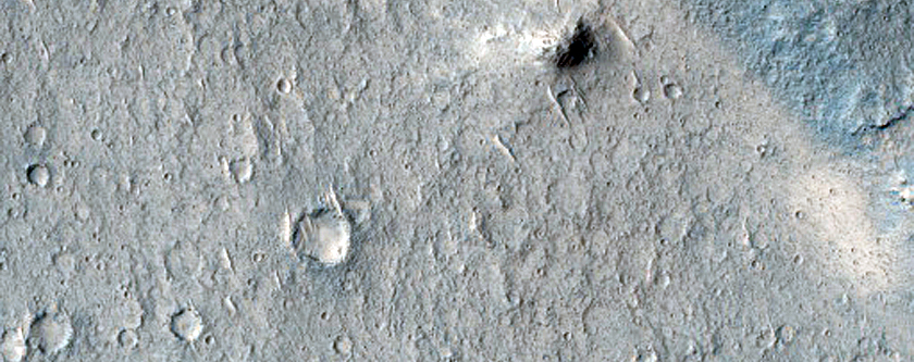 Light-Toned Materials near Ister Chaos