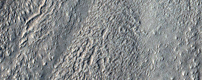 Ice-Filled Impact Crater with Rumpled Ejecta