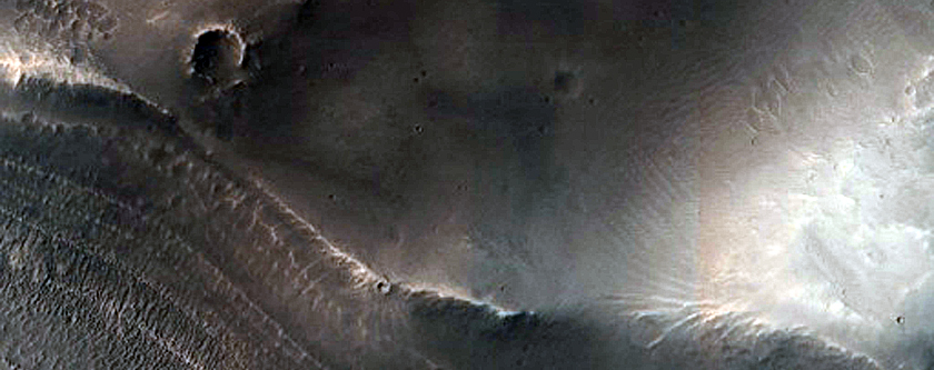 Valley Attached to Northern Mid-Latitude Crater