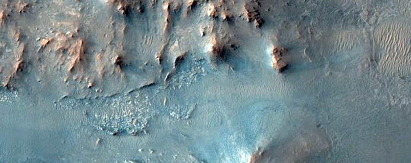 Possible Erosional Remnants of Jezero Crater Ejecta