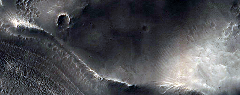Valley Attached to Northern Mid-Latitude Crater