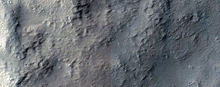 Ejecta Blanket and Distal Flows Southwest of Pettit Crater