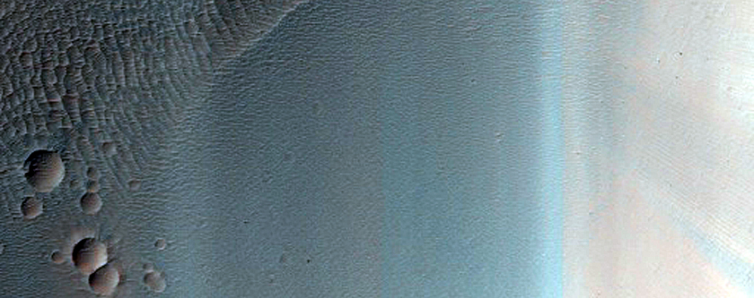 Channel Interacting with Crater in Samara Valles