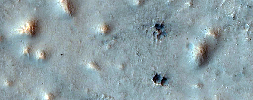 Cratered Cones in Northern Plains