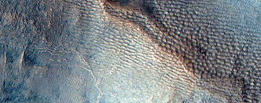 Layering in Crater Walls and Gullies with Bright Deposits