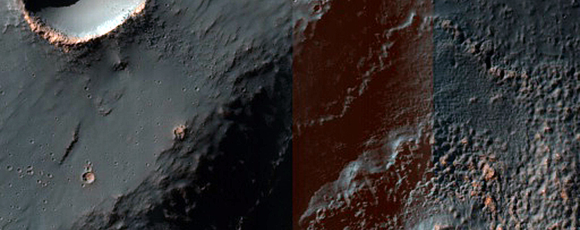 Bright Blocks in Channels near Aniak Crater