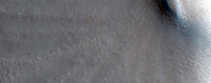 Pit in Ice Filled Crater in Alba Fossae