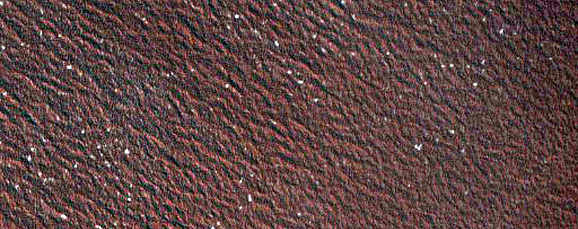 28 M Diameter Small Ice-Filled Crater in Trough