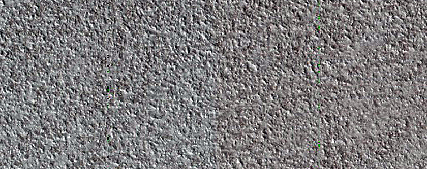 Exposed Layers in Olympia Mensae Icy Outliers