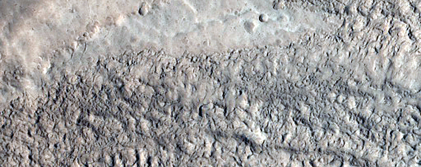 North-Pole-Facing Deposit in Crater Associated with Headwall Erosion